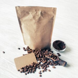 12 oz decaf coffee bag on a warm lifestyle background